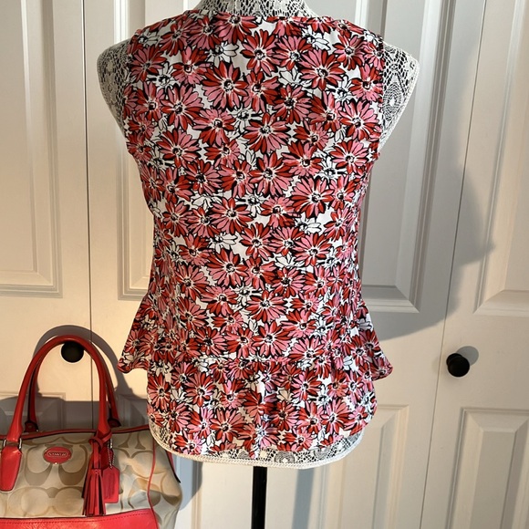 Cabi Seraphina #5730 Daisy ruffled flowy top over spaghetti strapped B&W tank. - Picture 7 of 10